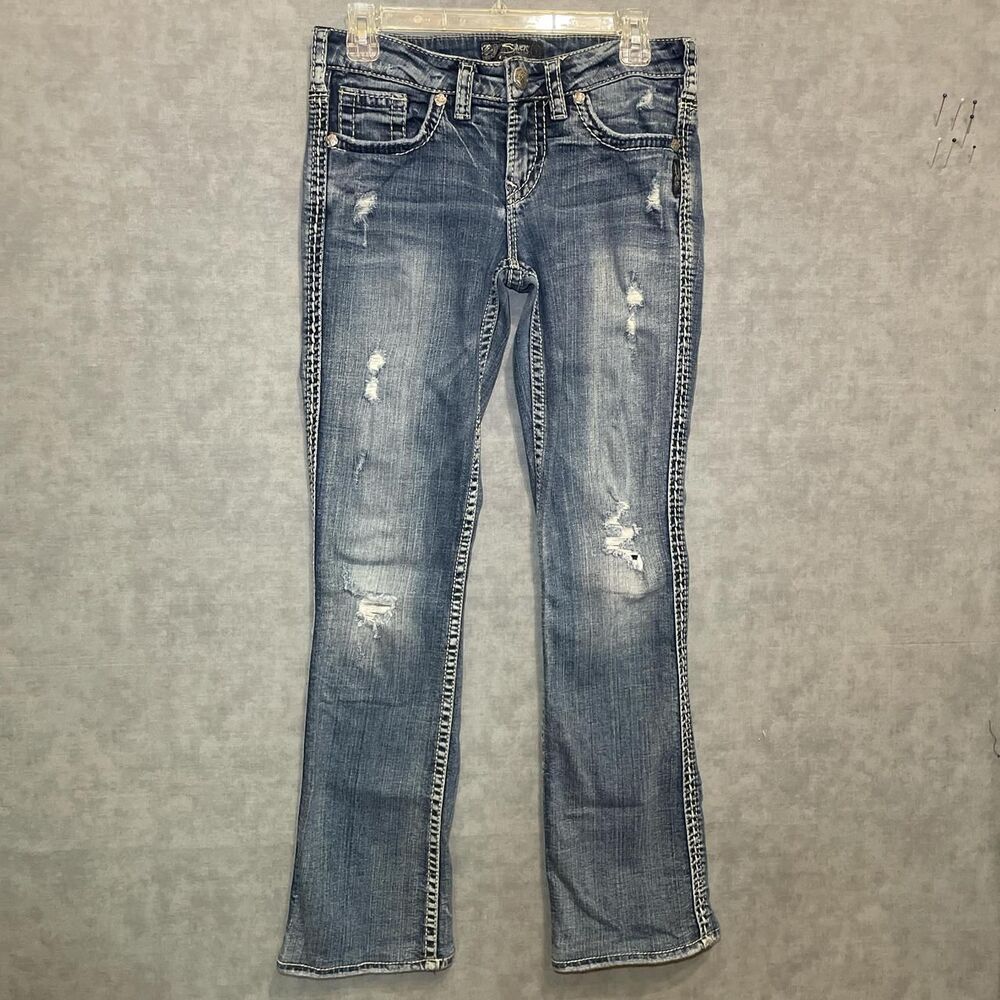 Silver distressed boot cut jeans